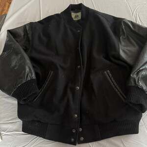 Classic Black Bomber Jacket with Leather Sleeves